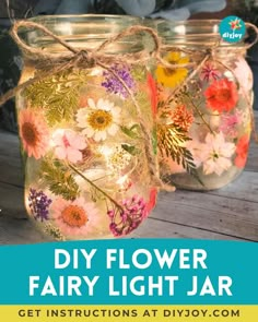 three mason jars with flowers painted on them and the words diy flower fairy light jar