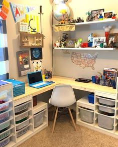 a white chair sitting in front of a desk with lots of toys on top of it