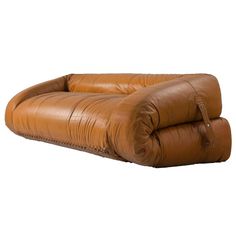 the reclining chair is made out of brown leather