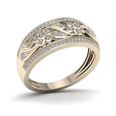 an intricately designed wedding ring with diamonds on the sides and inlaying leaves