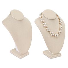 two mannequins with pearls on them are shown side by side, one is white and the other is gold