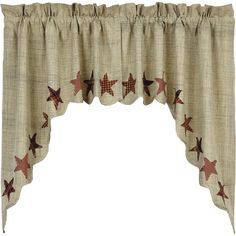 a window curtain with stars on it