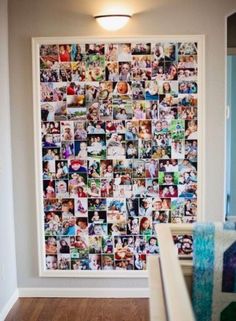 a wall with many pictures on it and a video play button in the bottom right corner