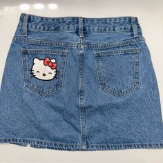 Hello Kitty Denim Skirt From Hello Kitty X Shein Collab. Never Worn, Was Too Big On Me But Because It Was In Storage With A Pair Of Heels, There’s A Small Mark Shown In The Last Photo. Tags: Charlotte Russe , Fashion Nova , Aeropostale , Papaya , H&M , Asos , Zaful , Boohoo , Revolve , Forever 21 , Wet Seal , Brandy Melville , Pacsun , Ootdfash , Prettylittlething , Plt , Shein , Ohpolly , I Am Gia , Pretty Little Thing , Miss Lola , Missguided , Houseofcb , Tiger Mist Naked Wardrobe , I.Am.Gia Cute Fitted Denim Skirt With Pockets, Cute Denim Blue Skirt, Cute Cotton Denim Skirt With Pockets, Cute High Waist Denim Skirt, Cute Blue Denim Skirt, Cute Blue Cotton Denim Skirt, Cute High-waisted Cotton Denim Skirt, Cute Denim Skirt With Pockets, Cute High Waist Cotton Denim Skirt