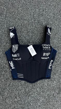 April Jean Libaton on Instagram: "Taking race day vibes to the next level with this custom Red Bull corset! 💨💙 How would you style this Red Bull corset?  . . . #RacingFashion #CorsetStyle #StreetwearFashion #RedBullRacing #CustomCorset #MotorsportFashion #EdgyFashion #TrackToStreet #LuxuryStreetwear #f1inspired  #oneofone  #lasvegasgp  #lasvegas  #corsettop  #apriljeanreflection" Linda Core, F1 Clothes, Tulum Style, Corset Top Outfit, Custom Corsets, Corset Training, Races Fashion, Casual Preppy Outfits, Young Justice