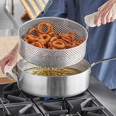 Achieve the crispy fry you want without the expense of adding a deep fryer with this Vollrath Wear-Ever fryer pot with basket! Perfect for frying up french fries or chicken fingers, this Vollrath 12 qt. aluminum fryer pot with basket is a perfect option for establishments wanting to offer fried foods without the expense of a deep fryer. Made from strong, 3004 aluminum material, this heavy-duty fryer pot is ideal for any commercial kitchen. This porous metal is sensitive to temperature change, wh Wave Typography, Luxury Sofa Living Room, Cooking Pasta, New Kitchen Gadgets, Bakery Kitchen, Kitchen Cupboard Designs, Colonial Kitchen, Gadgets Kitchen Cooking, Crispy Fry