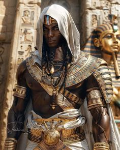 an egyptian man dressed in costume and jewelry