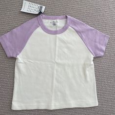 Brandy Melville Purple Sleeve Crop Top Tee Baseball Style Tee Never Worn Nwt 100% Cotton Basic White Summer Shirt, Light Purple Tops, Everyday Purple Short Sleeve Tops, White Short Sleeve Trendy Top, White Trendy Short Sleeve Tops, White Short Sleeve Basic Tops, Trendy White Short Sleeve Top, Purple Everyday Spring Top, Trendy Purple Everyday Top