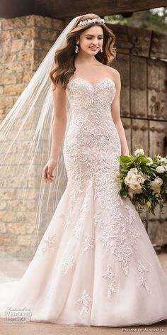 a woman in a wedding dress holding a bouquet