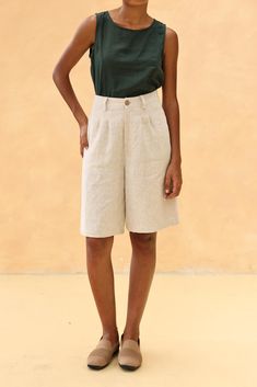 The linen loose-fitted knee-length shorts offer a comfortable and casual fit, perfect for warm days. Handcrafted in our studio to your measurements and preferences, available in over 60 colors. DETAILS - 100 % linen, medium weight (200gsm), free-shrinkage, amazingly soft feel - Knee-length shorts; different length is possible - Loose fit - High waisted - Pleated front - Front button and zipper - Inseam pockets - Custom made pants, FREE customizations; simply let us know your needs (hem length, fit style, leg opening width, belt, etc.). - Handcrafted in our studio, French seams, clean and meticulous COLOR - The color shown is Beige. - Available in over 60 colors, choose color in the color chart in the listing. - Link of fabric samples available here: https://madebygaiavn.etsy.com/listing/13 Linen Bermuda Shorts With Built-in Shorts And Relaxed Fit, Relaxed Fit High-waisted Bermuda Shorts For Vacation, Vacation High-waisted Bermuda Shorts With Relaxed Fit, Knee-length Bottoms With Built-in Shorts For Vacation, Relaxed Fit Linen Bermuda Shorts With Built-in Shorts, Summer Relaxed Fit Culottes With Pockets, Knee-length Bottoms With Pockets For Vacation, Wide Leg Beige Cotton Shorts, Knee-length Vacation Bottoms With Pockets