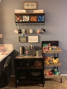 a coffee bar with two shelves filled with food