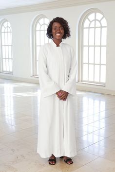 Your robe is hand crafted from our lightest weight linen look fabric, for year round comfort. This fabric blend is woven to have the appearance and texture of linen, without the wrinkles. It is low maintenance, durable, and holds its shape. Quick Ship Robes have preset sleeve and hem lengths based on your height (see chart in photos).  Please note, this robe runs large.    Details:  Loose fitting A-line with princess seams Front placket with full length concealed zipper Mandarin collar Flared sleeves Side seam pockets with microphone cord openings Unlined Style: 1080QS Fabric: White, Ivory, or Black Linen Look (70% Polyester/30% Rayon) Size: Small - 2X Care: Machine wash, hang dry. Dry clean. Clergy Robes, Women's Robe, Art House, Princess Seams, Bible Art, Princess Seam, Black Linen, Mandarin Collar, Flared Sleeves