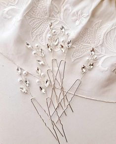 This Wedding hair pins set ,a beautiful and delicate hair accessory for brides.  On the wedding day, every bride wants to look fantastic. This delicate pins pearl will be a magical addition to your look on your happiest day.  This will emphasize the ease of your image.  The pins is very conveniently attached to the hair and fits in with any hairstyle.  -Material- jewelry wire, artificial pearls and metal leaves  -Colors- silver and white - Unique handmade.  Wedding - is one of the most important events in the life of any girl You deserve the best! Hair Piece For Wedding, Rhinestone Hair Pins, Rhinestone Hair Pin, Wedding Hair Jewelry, Bride Hair Accessories, Hair Jewellery, Rhinestone Hair, Wedding Hair Pins, Hair Jewelry Wedding