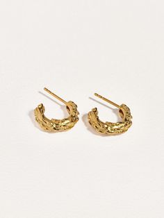 Celebrate the essence of your unique style with these stunning open hoop earrings. Drawing inspiration from the raw, organic textures of crumbling rock, these jewelry earrings provide a distinctive and elegant way to showcase your individuality. Thoughtfully designed with meticulous attention to detail, these half hoops offer a refined touch to any ensemble. Ideal for both special occasions and everyday wear, they add a subtle sparkle that speaks volumes about your taste and personality. Experie Earrings Drawing, Raw Texture, Best Gift For Wife, Half Hoop Earrings, Handmade Hoop Earrings, Open Hoop Earrings, Handcrafted Earrings, Gold Hoops, Earring Backs