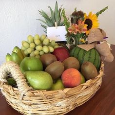 a basket filled with lots of different types of fruit