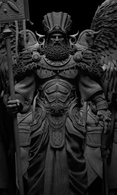 a statue of an angel holding two swords and wearing armor with wings on his head