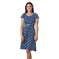 An easy fit and flare silhouette and comfy stretch-blend organic cotton make this nautical-inspired dress a spring and summer staple. Features short sleeves, a rounded neckline, and a faux waist tie for that feminine touch. Flattering fit and flare cut. The ultimate cozy dress you'll want to wear all season long. 95% Organic Cotton, 5% Spandex, exclusive of trims. Garment is 100% GOTS-Certified Organic. Faux waist tie is sewn into side seams and not removable. Features classic nautical-inspired Navy And White Dress, Cozy Dress, Fit And Flare Silhouette, High Quality Clothing, Womens Tie, Summer Staples, Inspired Dress, Nordstrom Dresses, Our Planet