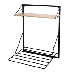 an iron and wood shelf with two shelves on each side, against a white background