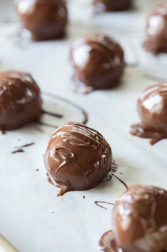 chocolate truffles on a baking sheet ready to be eaten