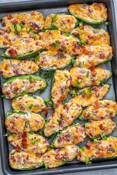 stuffed peppers with cheese and bacon in a baking pan