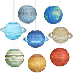 the solar system with eight planets hanging from strings