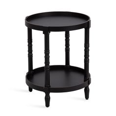 a black round table with wooden legs and an open shelf on the side, against a white background