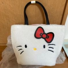 Hello Kitty Purse 9.5” X 7” White Bucket Bags With Removable Pouch, White Shoulder Bag For School, White Shoulder Bag Suitable As A Gift For School, Cute White Bucket Shoulder Bag, Cute White Shoulder Bag For Gift, White Pouch Bag For Daily Use, White Gift Shoulder Bag, White School Bag With Removable Pouch, Cute White Tote Bag