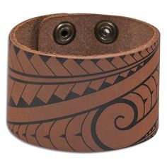 a brown leather bracelet with black and white designs