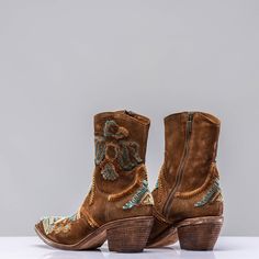 Have to say this is one of our absolute favorite boots for all year round! The embroidery is subtle, but adds that touch of color like that beautiful lonely blossom in the desert. Fit is comfortably true to size Handmade in Italy Luxury Bohemian Women's Cowboy Boots, Boot Embroidery, Mountain Fashion, Real Leather Boots, Boho Chic Dress, Casual Outerwear, Favorite Boots, In The Desert, Cool Boots