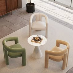 three chairs and a table in a room