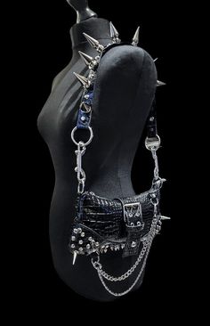 Edgy Black Bag With Chain Detail, Edgy Shoulder Bag With Rivets For Concerts, Punk Style Black Shoulder Bag For Evening, Gothic Shoulder Bag With Rivets For Alternative Fashion, Punk Style Shoulder Bag With Rivets For Concerts, Edgy Shoulder Bag With Hardware For Alternative Fashion, Punk Shoulder Bag With Rivets, Edgy Shoulder Bag With Hardware, Edgy Party Bags With Metal Hardware