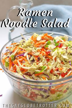 a glass bowl filled with coleslaw and carrots