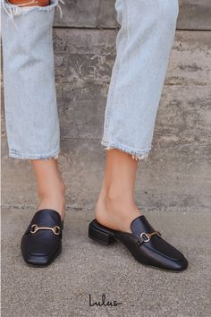 Step into quick style with the Lulus Ranae Black Slide-On Loafers! These cute mules have a squared toe, a notched collar, gold horsebit hardware, and an easy slide-on design. Low block heel lends just enough height to these chic loafer slides. 0. 5" wrapped block heel. Cushioned insole. Rubber sole has nonskid markings. Man made materials. Imported. Lulus | Ranae Black Slide-On Loafers. Chic Mules For Workwear With Round Toe, Chic Mules For Workwear With Buckle Closure, Chic Slip-on Loafers With Buckle Closure, Chic Horsebit Detail Slip-on Loafers, Chic Loafers With Horsebit Detail And Round Toe, Chic Loafers With Horsebit Detail, Low Heel Mules With Buckle Closure For Work, Workwear Low Heel Mules With Buckle, Workwear Mules With Buckle Closure And Low Heel