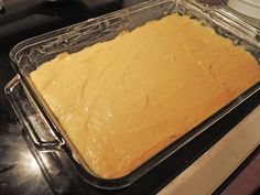 a pan filled with batter sitting on top of a counter