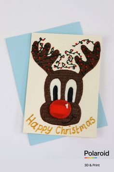 a close up of a greeting card with a reindeer head on it's face