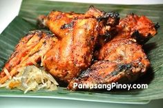 grilled chicken wings on a green plate