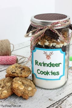 a jar filled with cookies sitting on top of a table