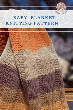 a knitted blanket with the words baby blanket knitting pattern in blue and orange colors