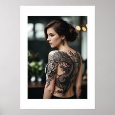 a woman with a dragon tattoo on her back