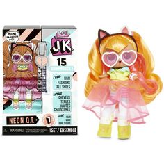 the doll is wearing pink glasses and a cat costume, with her hair in pigtails