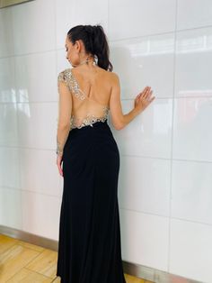 Description: The “Darcy” one shoulder gown! Sheer Bodice with a touch of Bling. A Must for that next Special Event. Style with your favorite heels and matching clutch for the evening. Model is 5.8"/size 2 and wearing size 4 or XS in the picture. All merchandise ship from United States. Please email info@danielleemon.com for additional sizes and colors. Product Details: Style: One Shoulder Hand Beaded Semi-Ball Gown Length: Long Fabric: 100% Polyester Fully Lined Closure: Hidden Side Zipper Care Luxury One-shoulder Evening Dress For Prom, Luxury One-shoulder Evening Dress For Gala, Luxury One Shoulder Dress With Asymmetrical Neckline, Luxury One Shoulder Evening Dress For Prom, Luxury One Shoulder Dress For Gala, Luxury One Shoulder Evening Gown, Luxury Evening Gown With Asymmetrical Neckline, Luxury One-shoulder Evening Gown, One Shoulder Gown With Sweep Train For Cocktail