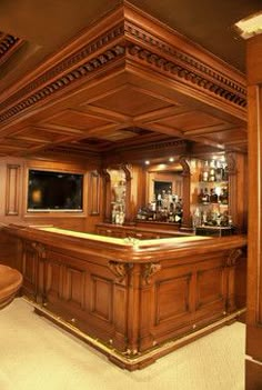 a large wooden bar in the middle of a room