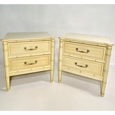 two wooden dressers sitting next to each other