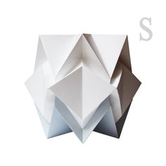 an origami sculpture is shown in white and blue colors on a white background