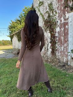 The Emilia Maxi Dress is the perfect choice for the fall and winter seasons. With its elegant design and long sleeves, this dress is both stylish and functional. Whether you're looking for a formal look or a cozy outfit, this maxi dress has you covered. Stay warm and look fabulous! Fabric 95% cotton, 5% spandex Fitted A-line Maxi Dress For Fall, Fall Elegant Maxi Dress, Elegant Long Maxi Dress For Fall, Brown Asymmetrical Hem Maxi Dress, Long Sleeve Sweater Dress For Fall Layering, Chic Long Sleeve Sweater Dress For Fall, Fall Season Full Length Maxi Dress, Fall A-line Fitted Maxi Dress, Full Length Maxi Dress For Fall