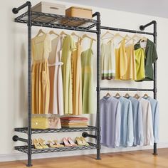 an organized closet with clothes and shoes hanging on the rack, next to a wall mounted shoe rack