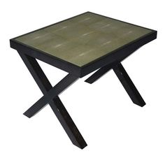 a small square table with an x design on the top and bottom, black metal legs