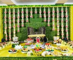 a table filled with lots of food and decorations