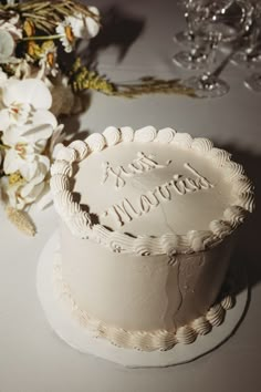 a white cake sitting on top of a table