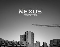 a black and white photo with the words nexus properties in front of tall buildings